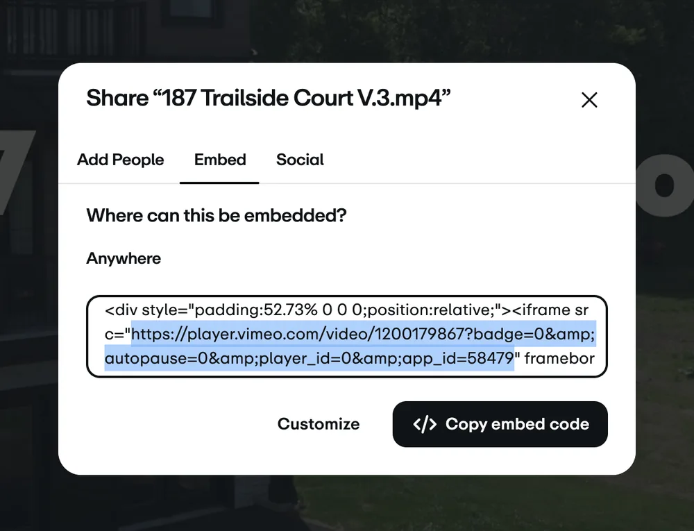 Vimeo share dialog with the Embed tab open and the player.vimeo.com URL highlighted inside the embed code